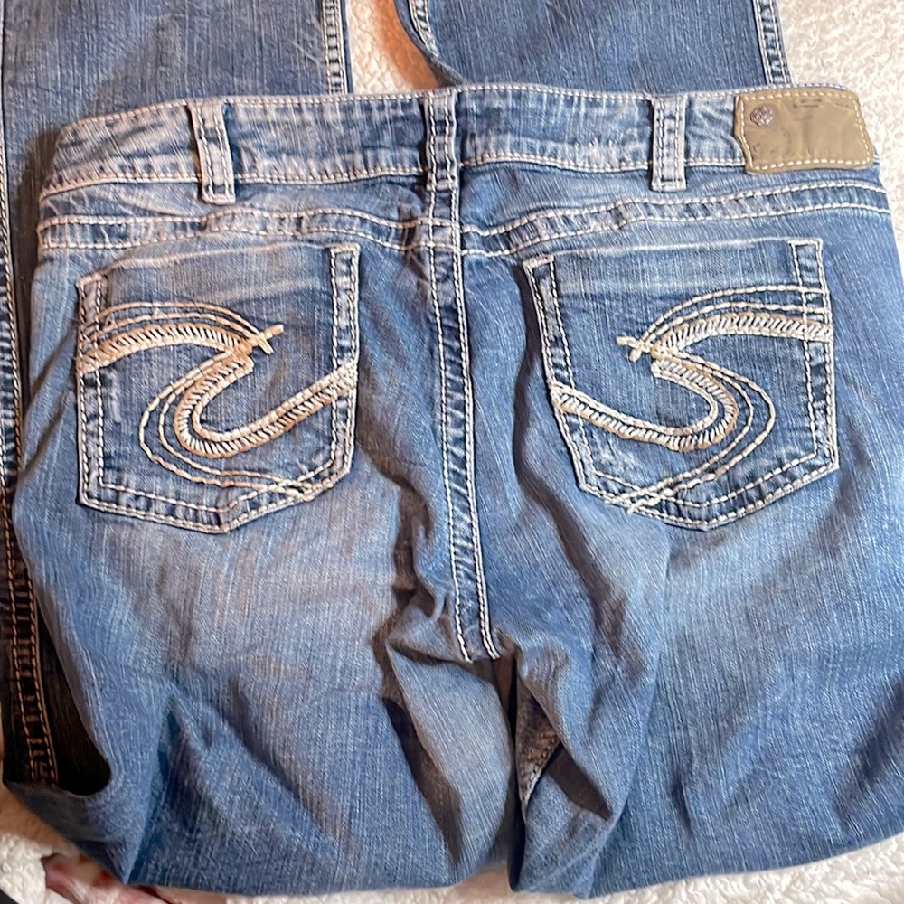 Size 36 / 33 long Silver Suki Distressed low rise bootcut jeans